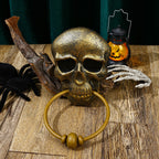 Sonnette de porte avec squelette et crâne