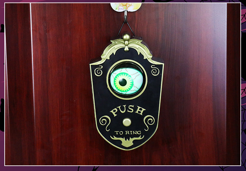 Sonnette de porte avec globe oculaire effrayant